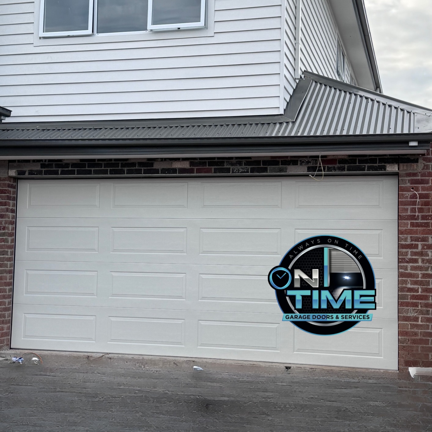White panel garage door installation